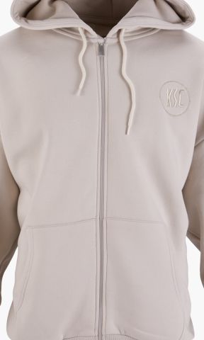 KSC Sweatjacke, Naturfarben, 80% Baumwolle, 20% Polyester, Dezentes KSC‑Logo auf der Brust, Durchgehender Front‑Reißverschluss, Verstellbare Kapuze mit Kordeln, Breite Bündchen und Eingrifftaschen für hohen Komfort