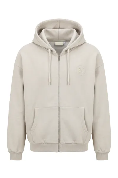 KSC Sweatjacke, Naturfarben, 80% Baumwolle, 20% Polyester, Dezentes KSC‑Logo auf der Brust, Durchgehender Front‑Reißverschluss, Verstellbare Kapuze mit Kordeln, Breite Bündchen und Eingrifftaschen für hohen Komfort